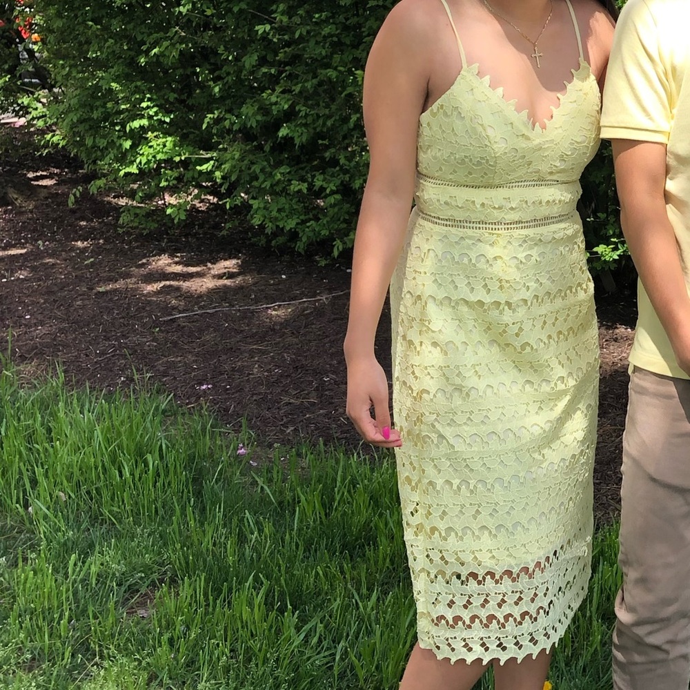 Small yellow mid-length lace dress